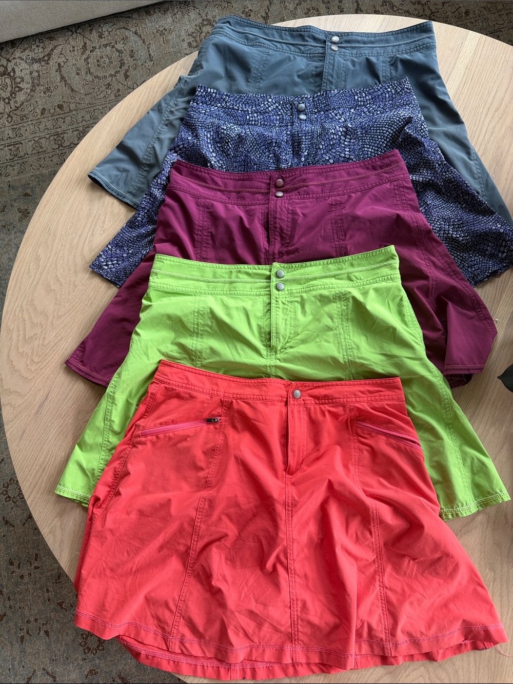 Five Title 9 Swingtastic skorts  in a variety of colors